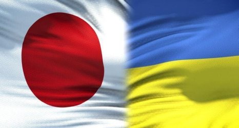 Japan and Ukraine flags background, diplomatic and economic relations, finance